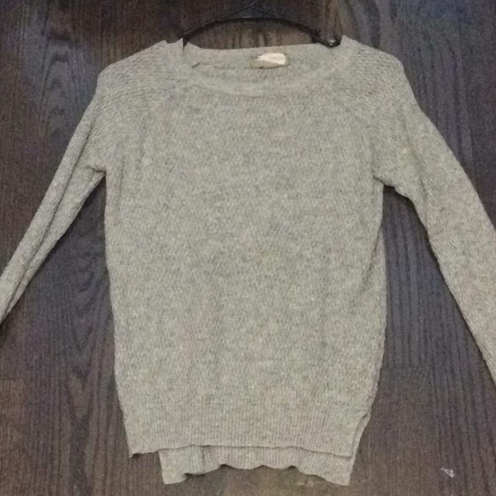 a gray sweater